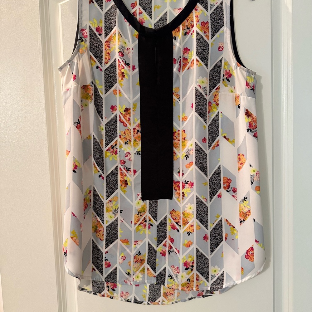 Black and Gray Sleeveless Blouse with Geometric Pattern
